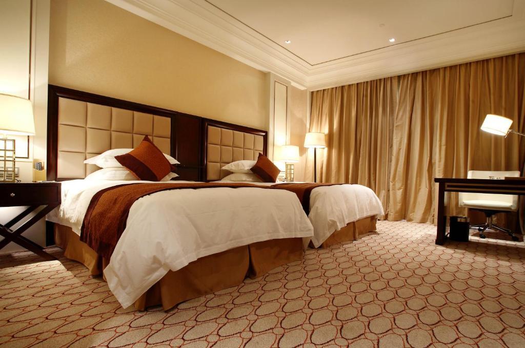 Landison Green Town Hotel Xinchang Værelse billede