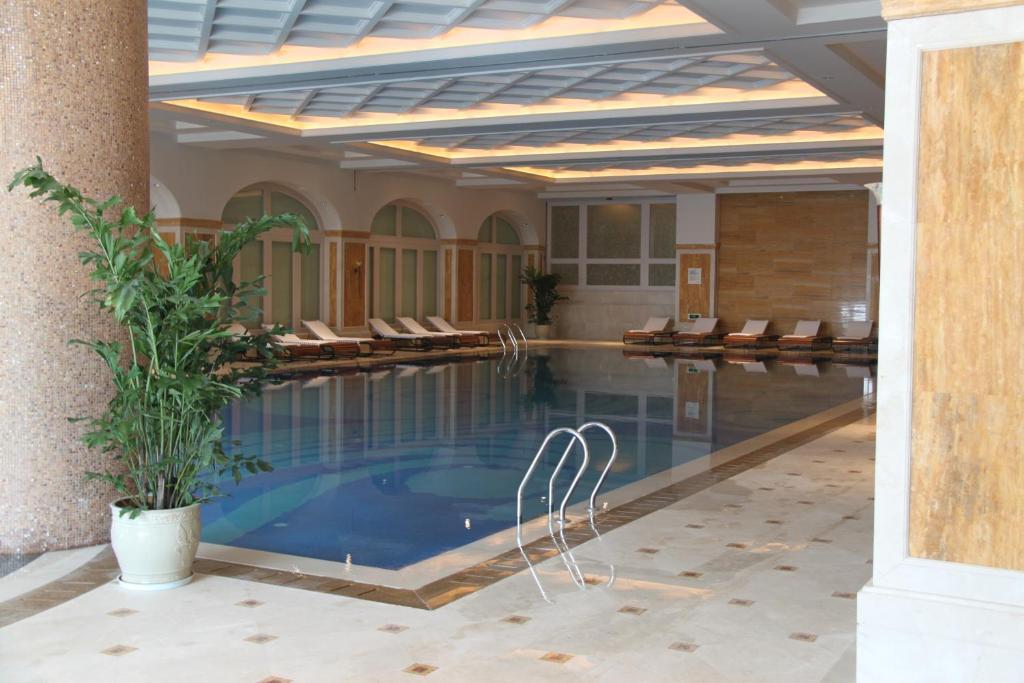 Landison Green Town Hotel Xinchang Eksteriør billede
